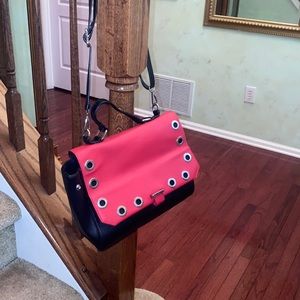 Cross body red and black bag with metal detail